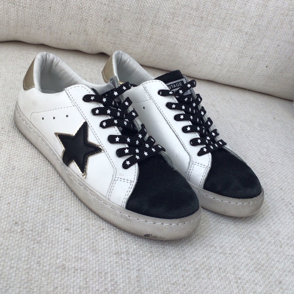 Vintage White Sneakers with Black Star and Gold Accents